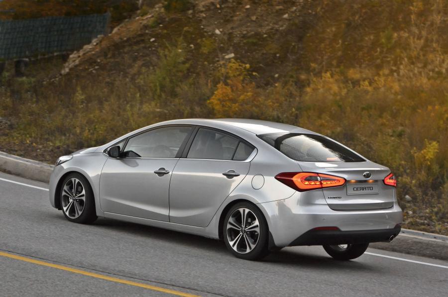  Kia Cerato 2013 года  (фото 7 из 9)